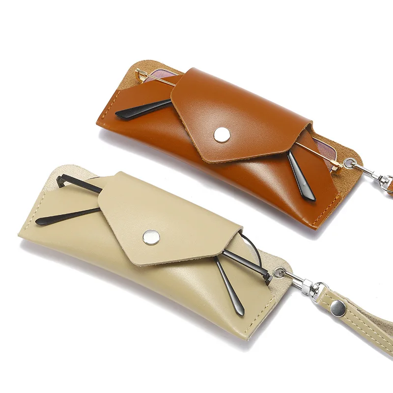 New portable glasses case sunglasses protective bag storage case with a strap or rope PU leather boxes for sunglasses, Multiple colors
New portable glasses case sunglasses protective bag storage case with a strap or rope PU leather boxes for sunglasses, Multiple colors