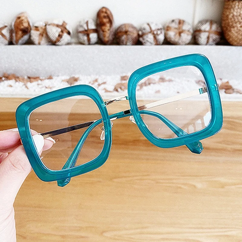 Wholesale Fashion Elegant Clear Black Blue Glasses Oversized Square Women Glasses 2021
Wholesale Fashion Elegant Clear Black Blue Glasses Oversized Square Women Glasses 2021