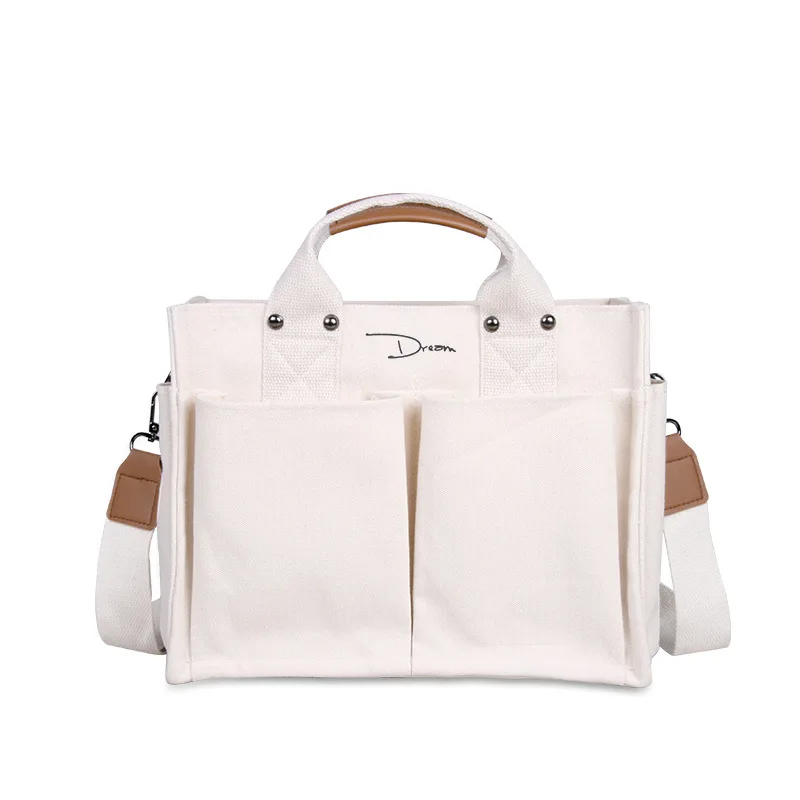 Large capacity Korean Multi designer pocket handbags One shoulder crossbody bags Female luxury student canvas bags, White
Large capacity Korean Multi designer pocket handbags One shoulder crossbody bags Female luxury student canvas bags, White