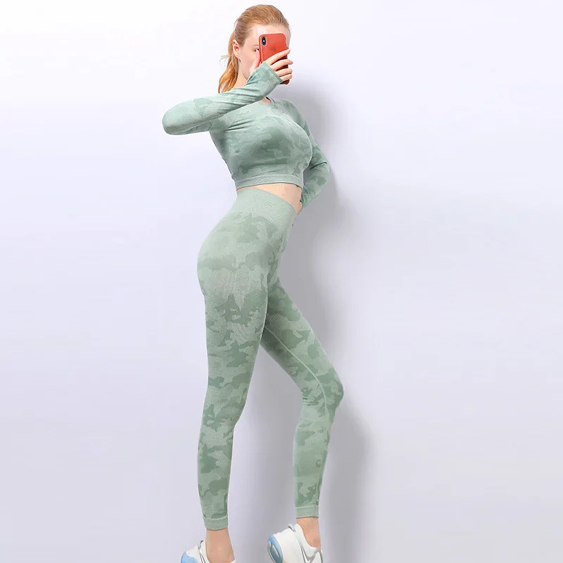 Wholesale Seamless Sportswear Yoga Suit Stretch Hollow Quick Drying Leggings And Long Sleeve Top Fitness Yoga Two Piece Set
Wholesale Seamless Sportswear Yoga Suit Stretch Hollow Quick Drying Leggings And Long Sleeve Top Fitness Yoga Two Piece Set
