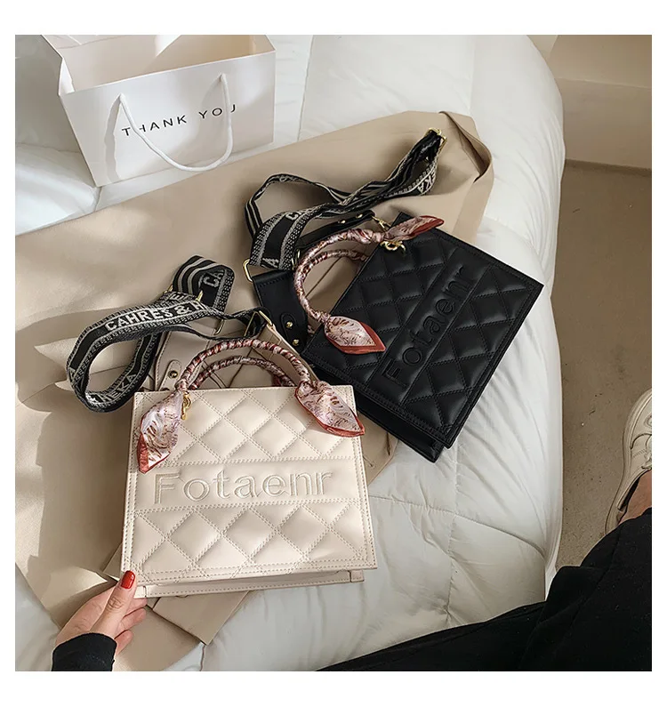 2021 Women handbags fashion scarf tote bag Wide band messenger bag with rhombic embroidery wholesale, Customizable
2021 Women handbags fashion scarf tote bag Wide band messenger bag with rhombic embroidery wholesale, Customizable