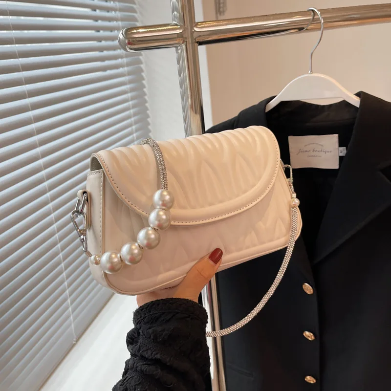 Popular pearl chains shoulder bag ladies hand bags leather designer women bags wholesale handbags
Popular pearl chains shoulder bag ladies hand bags leather designer women bags wholesale handbags