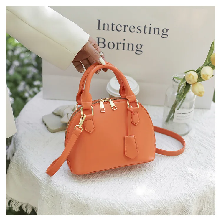 NEW trendy shell design purses handbags for women's hand bags ladies leather shoulder bag for summer
NEW trendy shell design purses handbags for women's hand bags ladies leather shoulder bag for summer