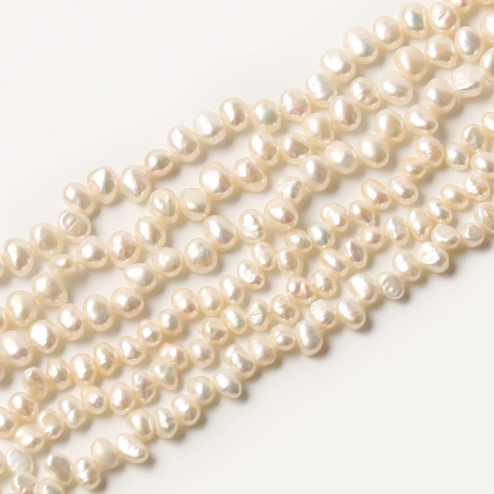 Wholesale 15 Inches 5-6mm/6-7mm Cross Hole Irregular Freshwater White Pearl Beads for Bracelet Necklace DIY 
Wholesale 15 Inches 5-6mm/6-7mm Cross Hole Irregular Freshwater White Pearl Beads for Bracelet Necklace DIY