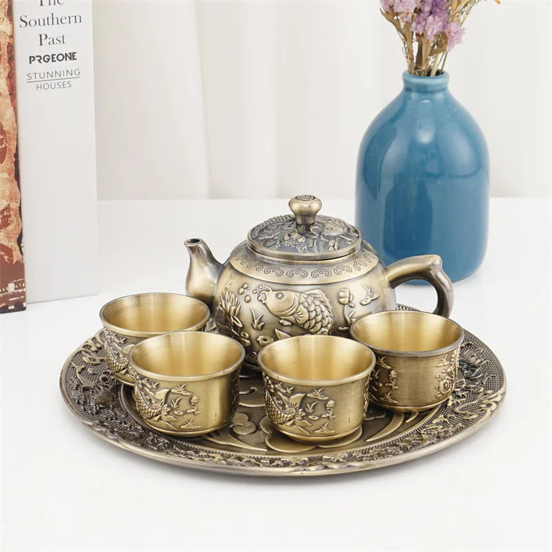 Fish pattern business gifts arts and crafts ornaments tin tea set whole set of teapot and cup tray Bronze red copper tea plate
Fish pattern business gifts arts and crafts ornaments tin tea set whole set of teapot and cup tray Bronze red copper tea plate