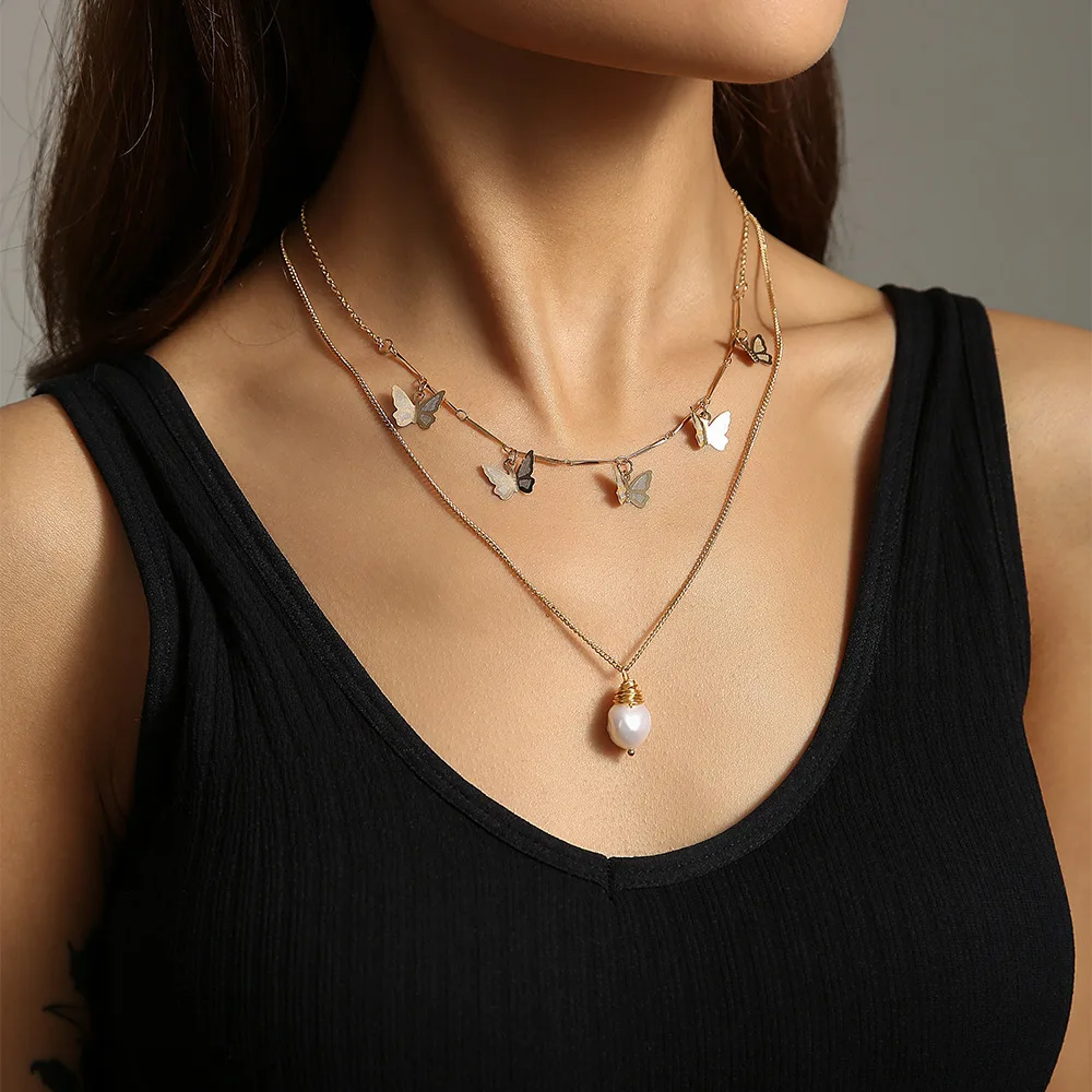 Elegant Gold pearl necklace gold plated necklace Golden butterfly clavicle chain Butterfly Pendant Charms
Elegant Gold pearl necklace gold plated necklace Golden butterfly clavicle chain Butterfly Pendant Charms