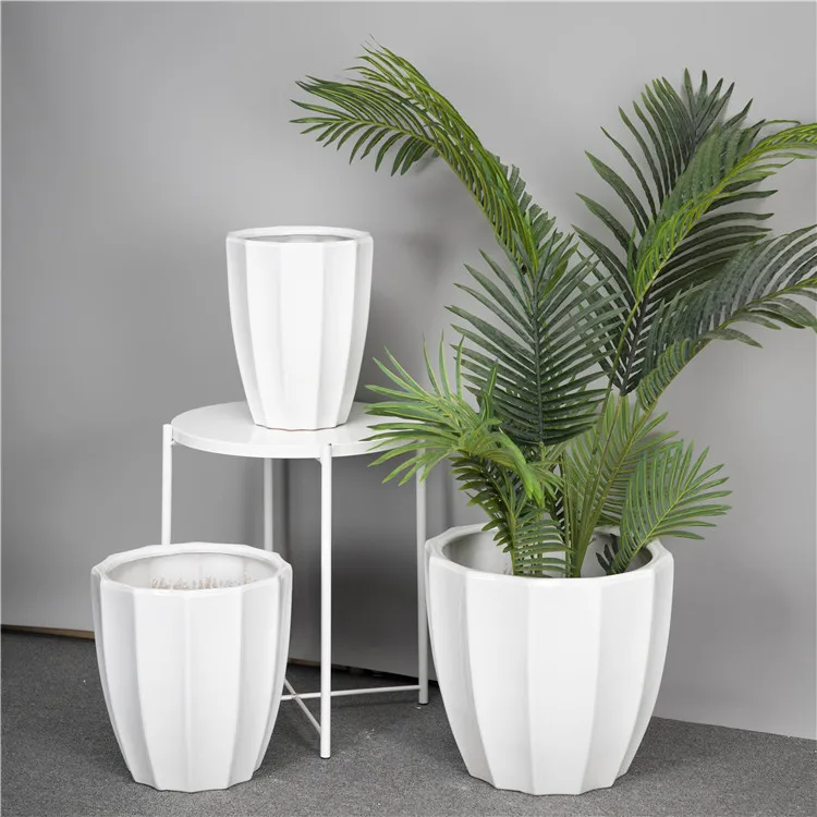 Indoor outdoor decoration high quality wholesale floor stripe relief ceramic flower pot
Indoor outdoor decoration high quality wholesale floor stripe relief ceramic flower pot