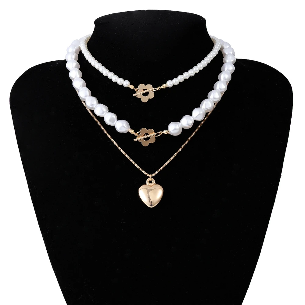 Elegant geometric imitation pearl Set simple temperament small flower ot Button Heart Necklace
Elegant geometric imitation pearl Set simple temperament small flower ot Button Heart Necklace