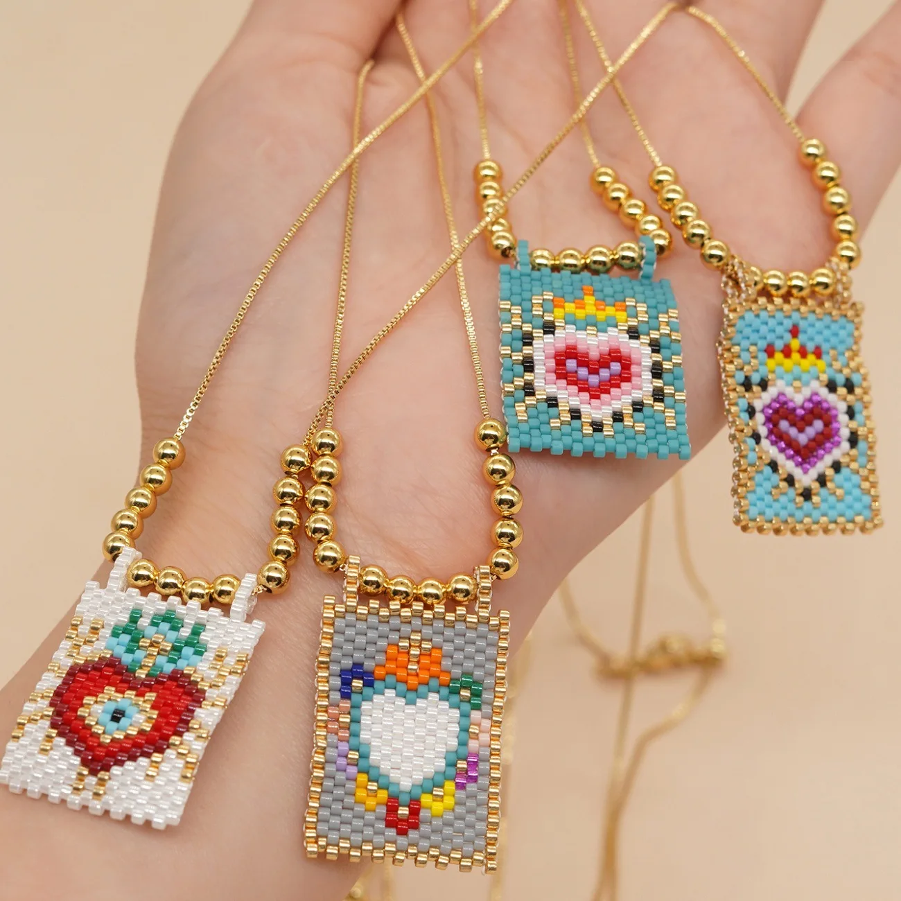 2023 Bohemian Style Woven Pendant Heart Necklace Brass Gold Beads Necklace Miyuki Beads Thread Necklace for women
2023 Bohemian Style Woven Pendant Heart Necklace Brass Gold Beads Necklace Miyuki Beads Thread Necklace for women