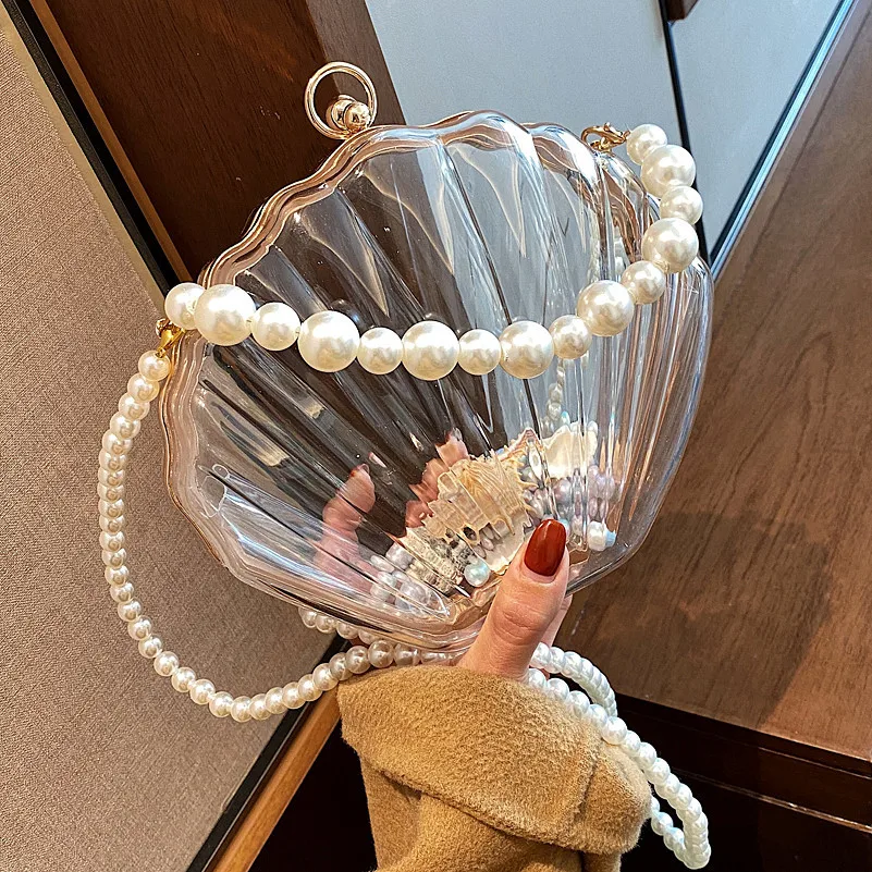 Wholesale Luxury Acrylic Shell Transparent Womens Purses Chain Shoulder Clear Purses 2023 Pentagram Women Handbags Handbag
Wholesale Luxury Acrylic Shell Transparent Womens Purses Chain Shoulder Clear Purses 2023 Pentagram Women Handbags Handbag