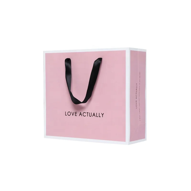 Custom Logo Pink Paper Shopping Bag with Ribbon Handle for Clothing Boutique Gift Packaging, Customized color 
Custom Logo Pink Paper Shopping Bag with Ribbon Handle for Clothing Boutique Gift Packaging, Customized color