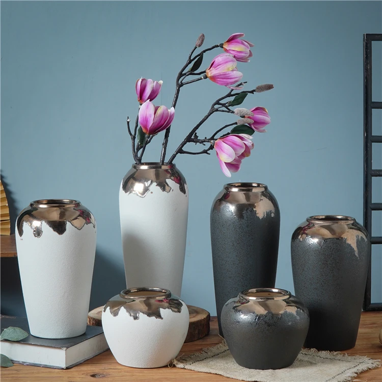 New arrival high quality handmade ceramic flower vases creative home wedding decor porcelain vases
New arrival high quality handmade ceramic flower vases creative home wedding decor porcelain vases
