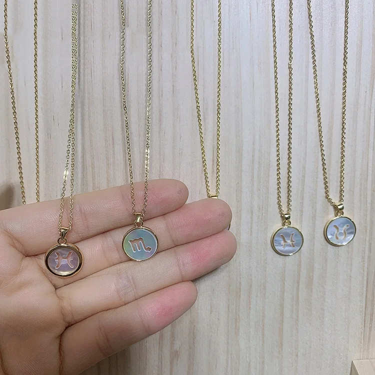 New round 18K gold plated mother of pearl 12 zodiac constellation charm shell pendant necklace for jewelry gift
New round 18K gold plated mother of pearl 12 zodiac constellation charm shell pendant necklace for jewelry gift
