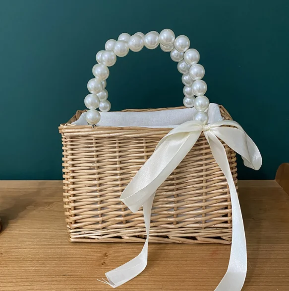 Summer New INS Hot Selling Pearl Straw Bag Fashion Pearl Handbag Beach Holiday Wind Pearl Handle Basket Bag
Summer New INS Hot Selling Pearl Straw Bag Fashion Pearl Handbag Beach Holiday Wind Pearl Handle Basket Bag