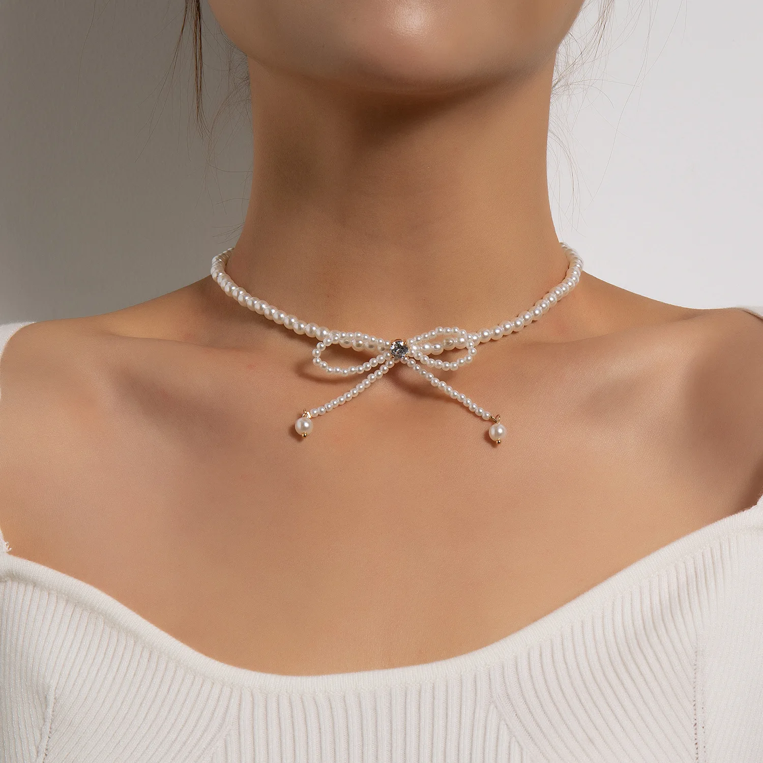 New Fashion Elegant Style Adjustable Pearl Chain Bow Knot Pendant Pearl Choker Necklace for Women Jewelry
New Fashion Elegant Style Adjustable Pearl Chain Bow Knot Pendant Pearl Choker Necklace for Women Jewelry