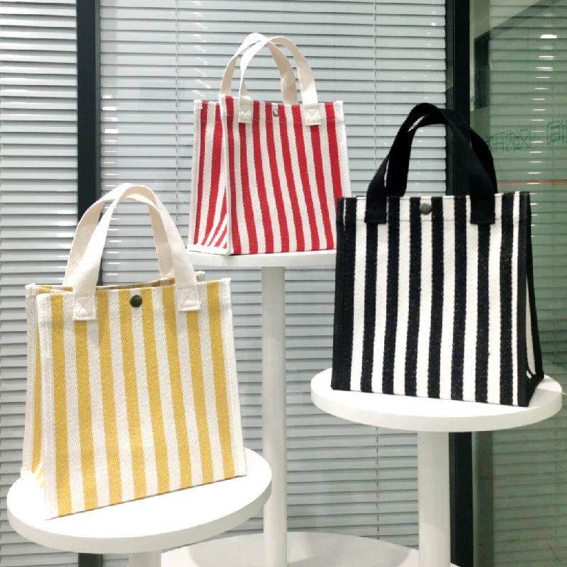 Japanese striped canvas handbag women's wide-bottom portable eco-friendly cloth bag outing shopping bag, Customizable
Japanese striped canvas handbag women's wide-bottom portable eco-friendly cloth bag outing shopping bag, Customizable