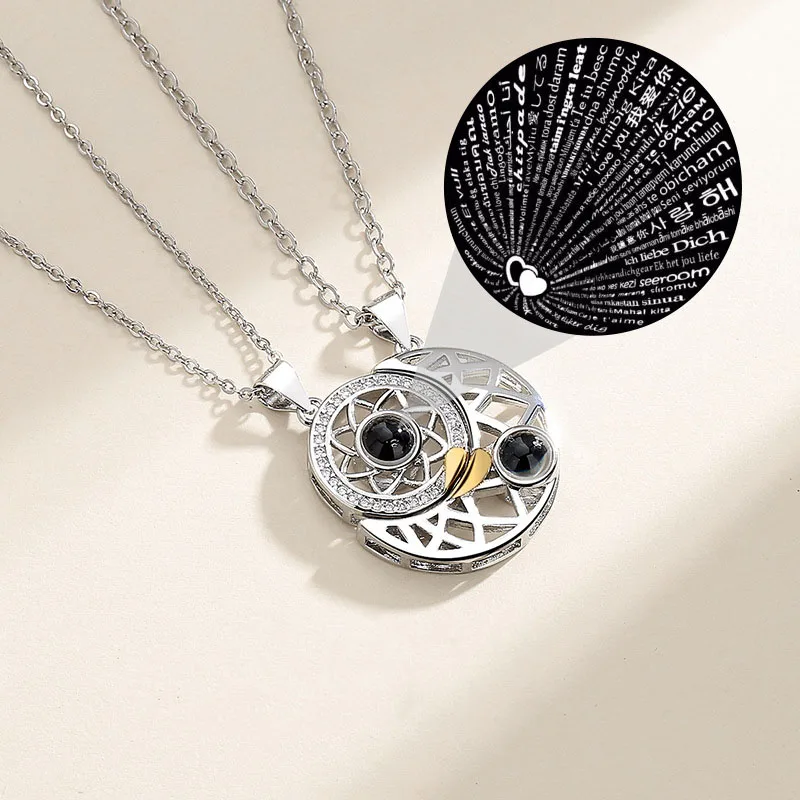Lovers magnetic necklace sun and moon love splicing projection 100 languages I love you set necklace for couple
Lovers magnetic necklace sun and moon love splicing projection 100 languages I love you set necklace for couple
