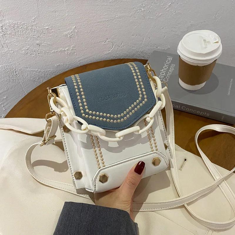 Hot Selling Korean texture contrast color designer bag rivet chain shoulder crossbody women mini purse hand bag
Hot Selling Korean texture contrast color designer bag rivet chain shoulder crossbody women mini purse hand bag