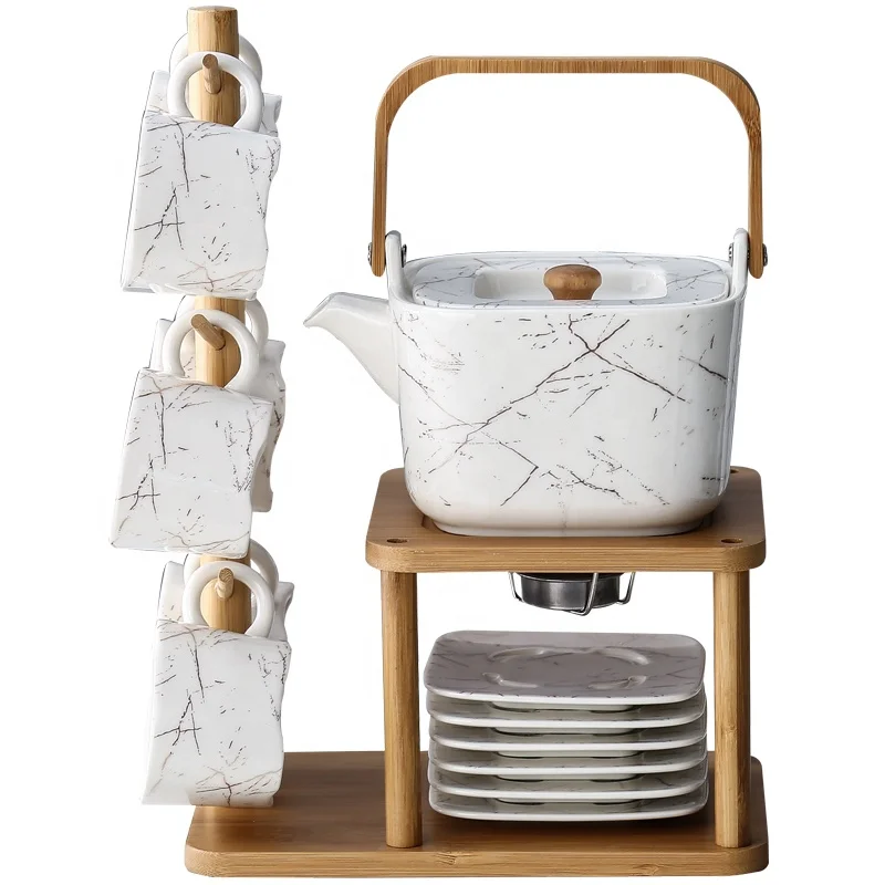 Japanese Ceramic Cup Tea Pot Set Kungfu Marble Tea Set With Stand Rack White Porcelain Tea Cups, Customized color
Japanese Ceramic Cup Tea Pot Set Kungfu Marble Tea Set With Stand Rack White Porcelain Tea Cups, Customized color