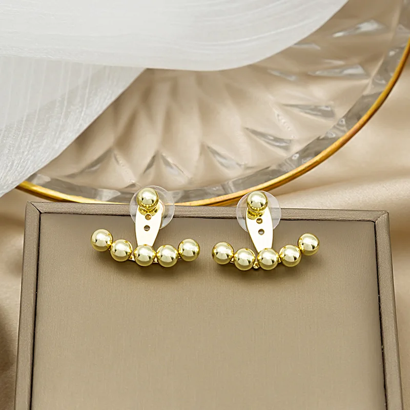 Premium quality silver needle golden beanie earrings metal round bead smile stud earrings for women
Premium quality silver needle golden beanie earrings metal round bead smile stud earrings for women