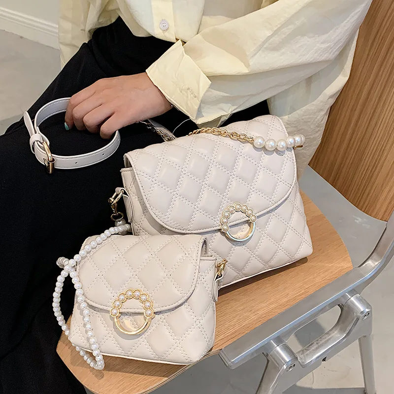 Lingge embroidery thread fashion handbags 2021 trendy fashion pearl messenger bag popular small square bag purses and handbags, 4 colors
Lingge embroidery thread fashion handbags 2021 trendy fashion pearl messenger bag popular small square bag purses and handbags, 4 colors