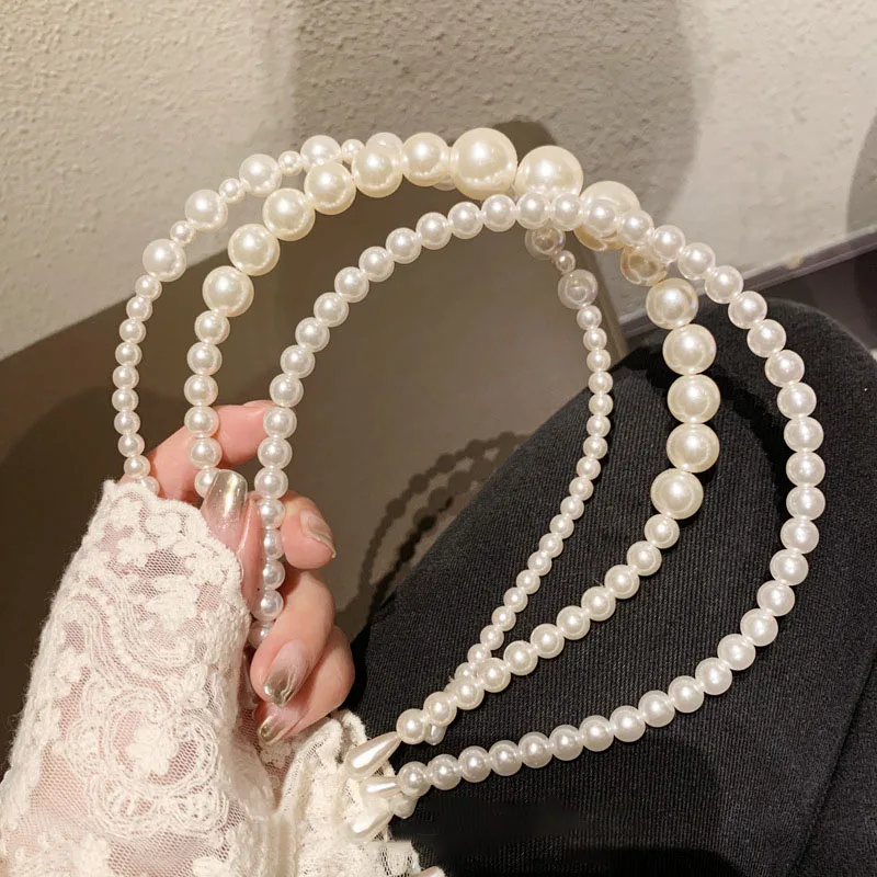 CLARMER 2022 Korean new design vintage pearl accessory hair band ins fashion girls sweet elegant geometric plastic headband
CLARMER 2022 Korean new design vintage pearl accessory hair band ins fashion girls sweet elegant geometric plastic headband