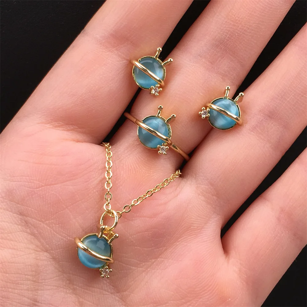 3 Pcs Jewelry Set Cat Eye Stone Planet Stud Earring Necklace Ring Set 14K Gold Plated O Shape Chain Crystal Planet Necklace
3 Pcs Jewelry Set Cat Eye Stone Planet Stud Earring Necklace Ring Set 14K Gold Plated O Shape Chain Crystal Planet Necklace