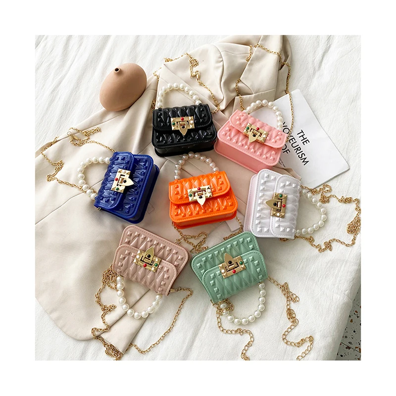 Fashion Rivet Mini Jelly Messenger Bags Korean Girls Designer Pearl Handle Shoulder Bags Chic Handbags For Women Small Purses
Fashion Rivet Mini Jelly Messenger Bags Korean Girls Designer Pearl Handle Shoulder Bags Chic Handbags For Women Small Purses