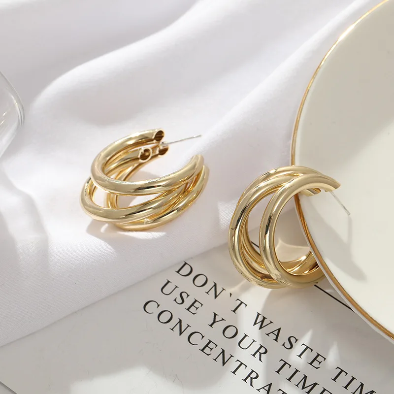 Custom European and American style Bright gold dumb gold plated Triple ring C shape hoop Earrings
Custom European and American style Bright gold dumb gold plated Triple ring C shape hoop Earrings