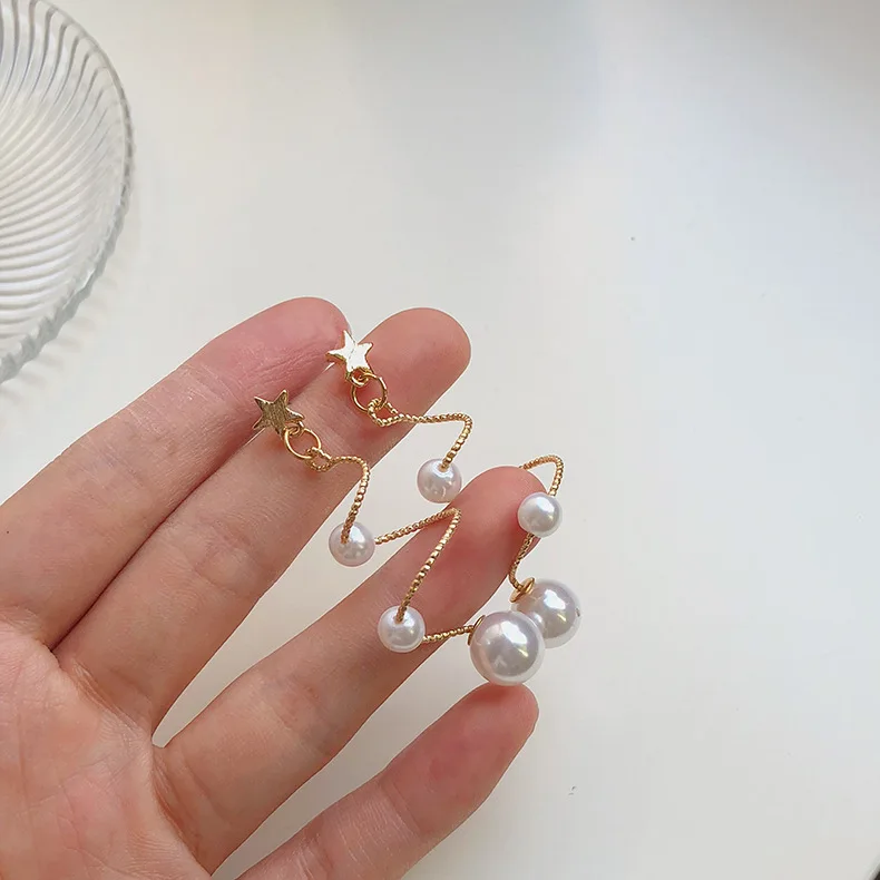 JUHUNew star personality wild five-pointed star earrings spiral around pearl earrings sweet and romantic accessories for women, Gold
JUHUNew star personality wild five-pointed star earrings spiral around pearl earrings sweet and romantic accessories for women, Gold