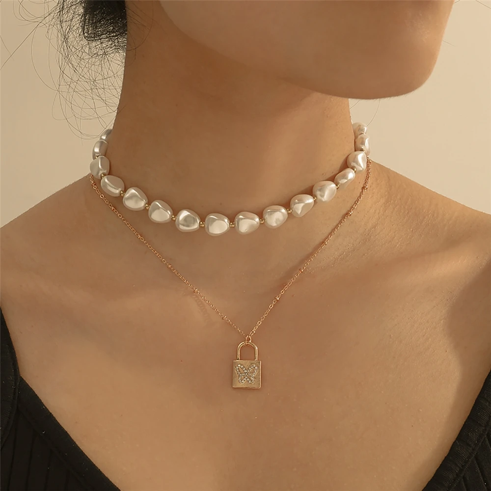 Temperament geometric irregular imitation pearl necklace creative lock butterfly micro inlaid Necklace, Golden suit 0752
Temperament geometric irregular imitation pearl necklace creative lock butterfly micro inlaid Necklace, Golden suit 0752