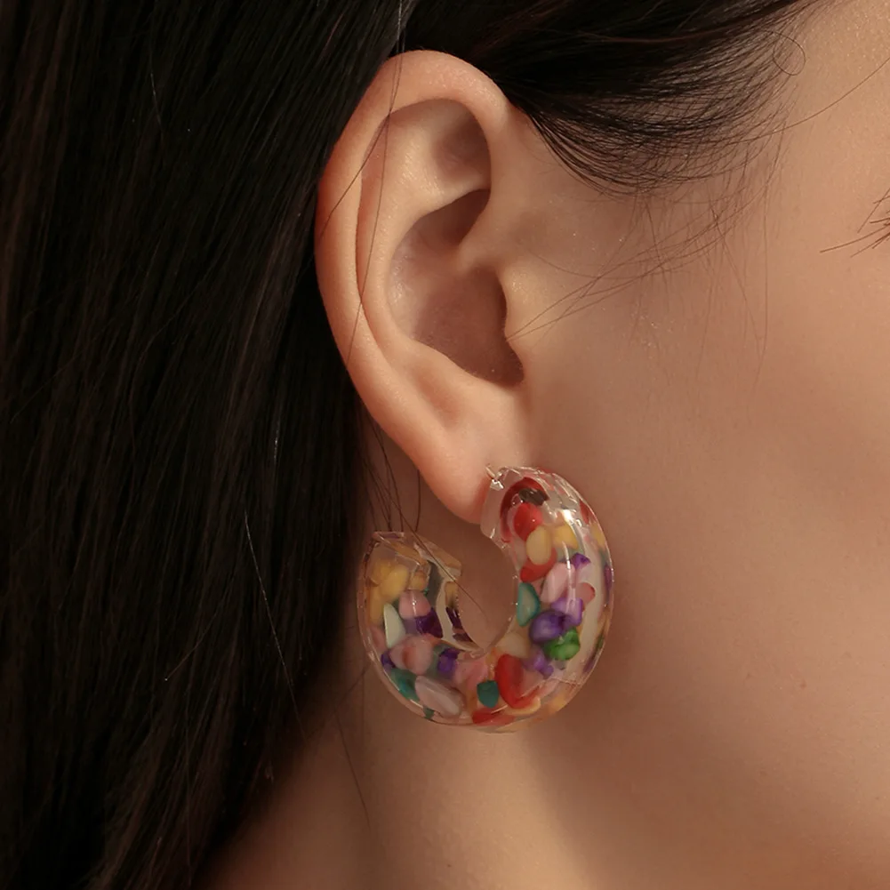 European and American Transparent Resin Crushed Stone Earrings Geometric Color Stone Pearl C-shaped Earrings
European and American Transparent Resin Crushed Stone Earrings Geometric Color Stone Pearl C-shaped Earrings