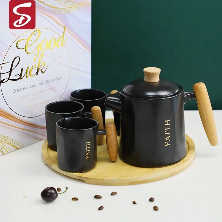 SHARDON Wooden Handle Japanese Ceramic Tea Set Cup Teapot Sets With Tea Infuser Gift Box Packaging One Pot And Four Cups
SHARDON Wooden Handle Japanese Ceramic Tea Set Cup Teapot Sets With Tea Infuser Gift Box Packaging One Pot And Four Cups