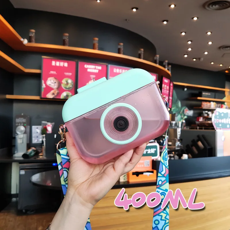 YIDING New style cute camera shape plastic water bottle customized wholesale travel water bottle with straw and strap, As is or customized
YIDING New style cute camera shape plastic water bottle customized wholesale travel water bottle with straw and strap, As is or customized