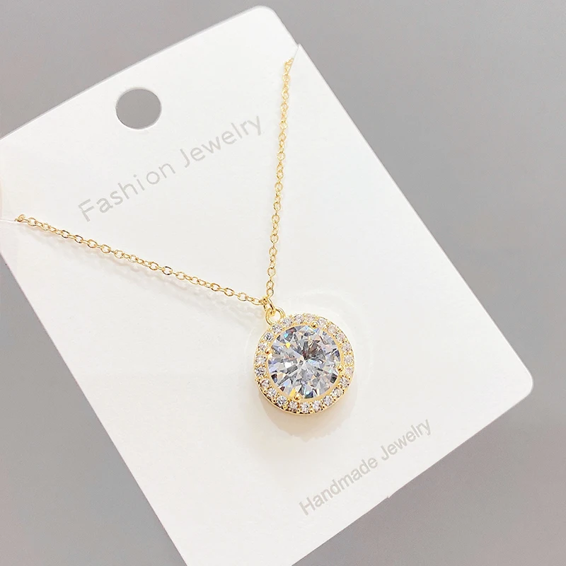 XL89651 Fashion design gold plated brass women jewelry round zircon pendant necklaces
XL89651 Fashion design gold plated brass women jewelry round zircon pendant necklaces