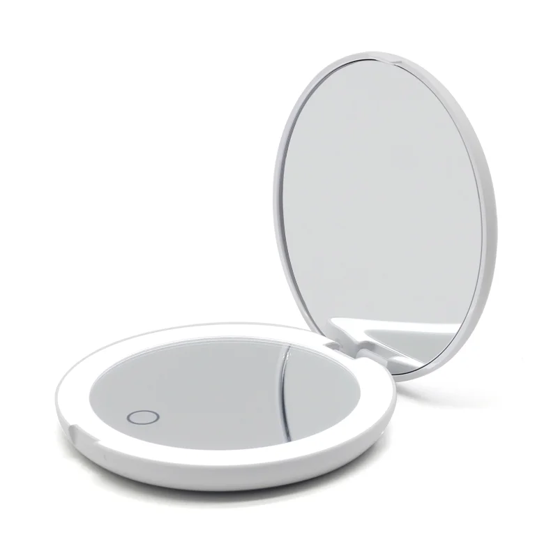 Mini portable LED makeup mirror with light makeup girl with a round small mirror wholesale
Mini portable LED makeup mirror with light makeup girl with a round small mirror wholesale