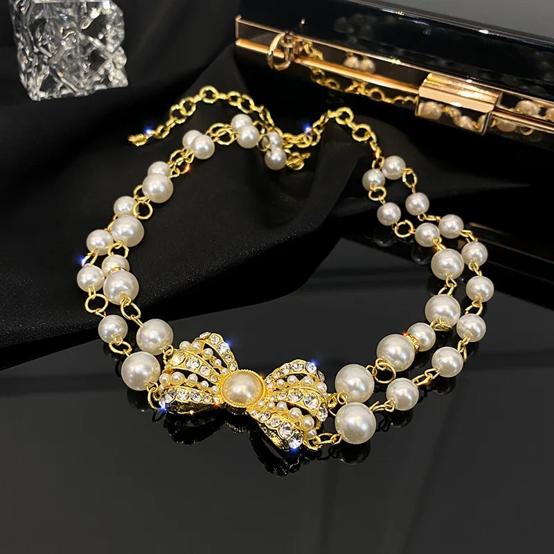 2021 New Popular Bow Necklace Double Pearl Short Clavicle Chain Pearl Necklace Hot Sale Female Womens Jewelry Necklace
2021 New Popular Bow Necklace Double Pearl Short Clavicle Chain Pearl Necklace Hot Sale Female Womens Jewelry Necklace