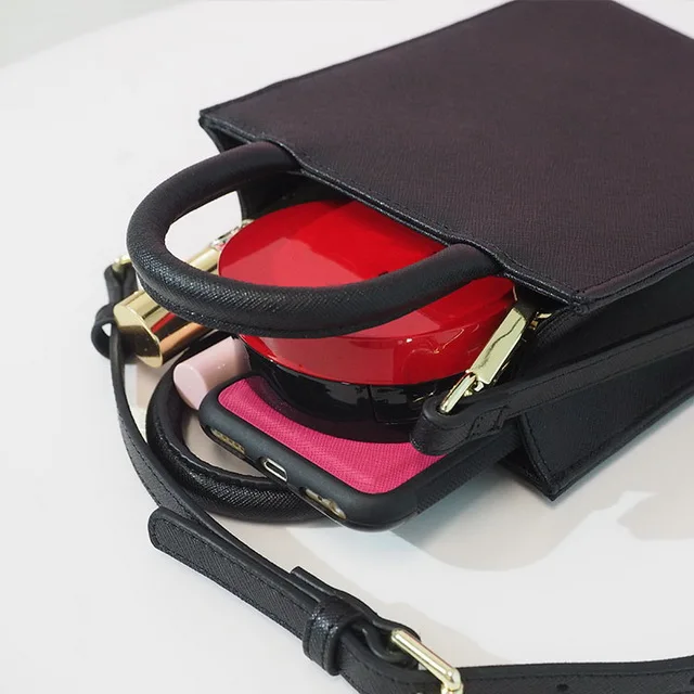 Newest fashion small long leather strap saffiano black top handle girls crossbody shoulder bag
Newest fashion small long leather strap saffiano black top handle girls crossbody shoulder bag