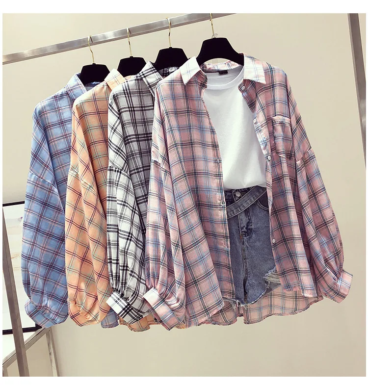 New sunblock loose long sleeve plaid shirt cardigan thin coat 
New sunblock loose long sleeve plaid shirt cardigan thin coat