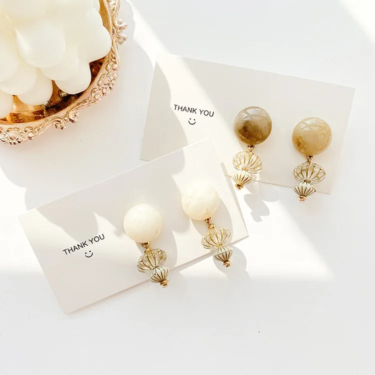 JUHU 2021 summer stylish geometric personality artistic resin ball drop earring silver needle conch resin stud earring for women, Gold
JUHU 2021 summer stylish geometric personality artistic resin ball drop earring silver needle conch resin stud earring for women, Gold