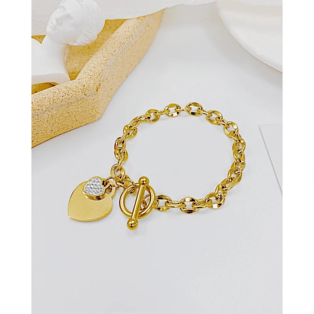 Wholesale Fashion Heart Shaped Stainless Steel Bracelet Personalized OT Button High Grade Titanium Steel Zircon Bracelet
Wholesale Fashion Heart Shaped Stainless Steel Bracelet Personalized OT Button High Grade Titanium Steel Zircon Bracelet