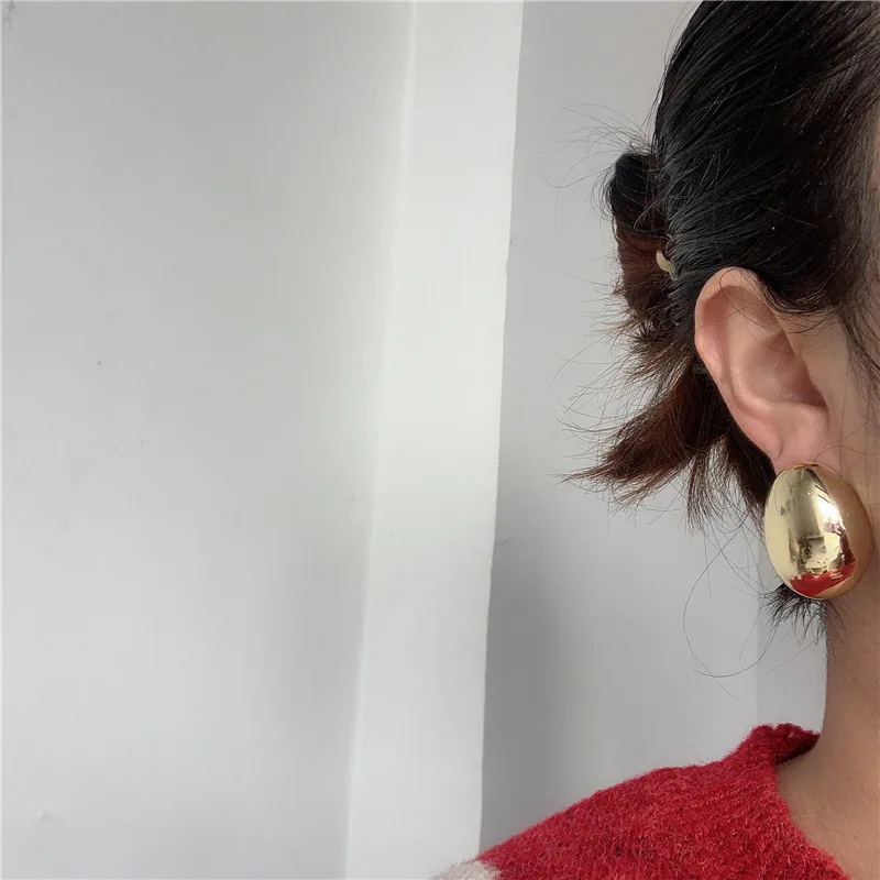 Glossy earrings female personality round ball exaggerated earrings metal simple temperament wild design earrings women
Glossy earrings female personality round ball exaggerated earrings metal simple temperament wild design earrings women