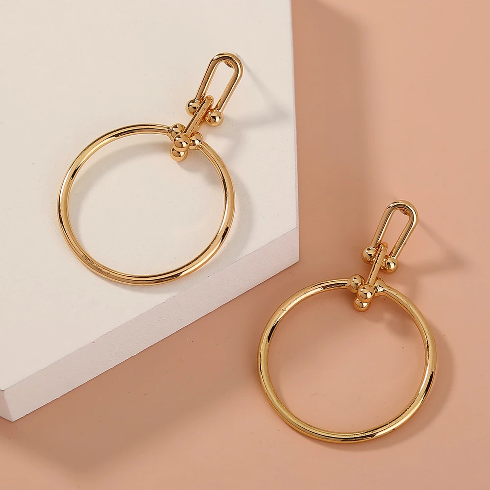 NE943 Fashion Golden Round Shape High Quality Drop Earrings for Parties Outdoors Activities
NE943 Fashion Golden Round Shape High Quality Drop Earrings for Parties Outdoors Activities