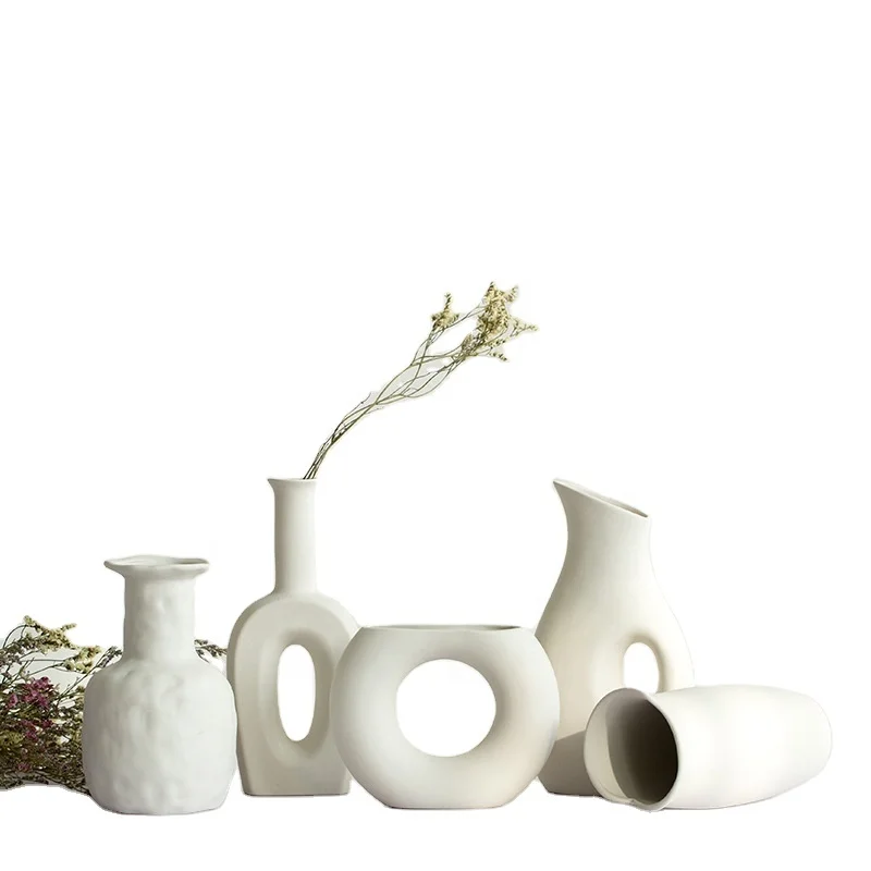 Modern Handmade Art Porcelain Ceramic White Vase Decoration For Home White Ceramic Irregular Flower Vase Plant
Modern Handmade Art Porcelain Ceramic White Vase Decoration For Home White Ceramic Irregular Flower Vase Plant