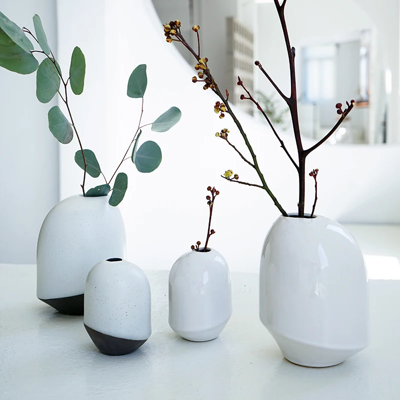 Nordic simple style irregular shape ceramic mini flower vases for indoor decor, White
Nordic simple style irregular shape ceramic mini flower vases for indoor decor, White