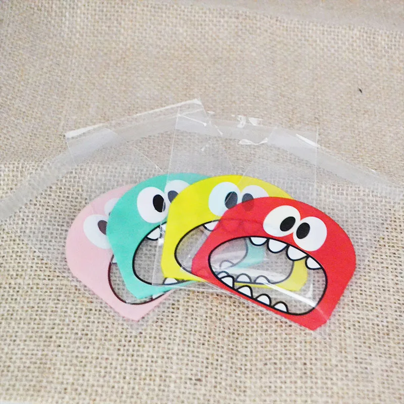 Hot sale Cute Monster Sharp Teeth plastic bags Xmas Gift Packaging Bags Wedding Candy opp bag Birthday Easter Party Decor
Hot sale Cute Monster Sharp Teeth plastic bags Xmas Gift Packaging Bags Wedding Candy opp bag Birthday Easter Party Decor