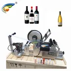 Low price manual wine bottle labeling and label printing machine