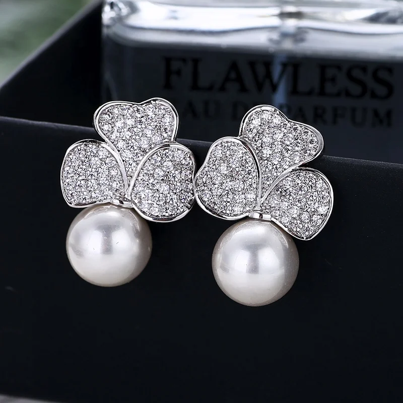 Elegant Flower Pearl Stud Earrings Micro Pave Cubic Zircon Earrings for Fashion Women Wedding Jewelry
Elegant Flower Pearl Stud Earrings Micro Pave Cubic Zircon Earrings for Fashion Women Wedding Jewelry