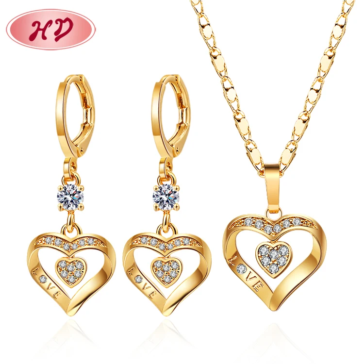 Bulk jewellery for sale 18k gold electroplated heart drop earrings & necklaces jewelry set American trending jewelry sets
Bulk jewellery for sale 18k gold electroplated heart drop earrings & necklaces jewelry set American trending jewelry sets