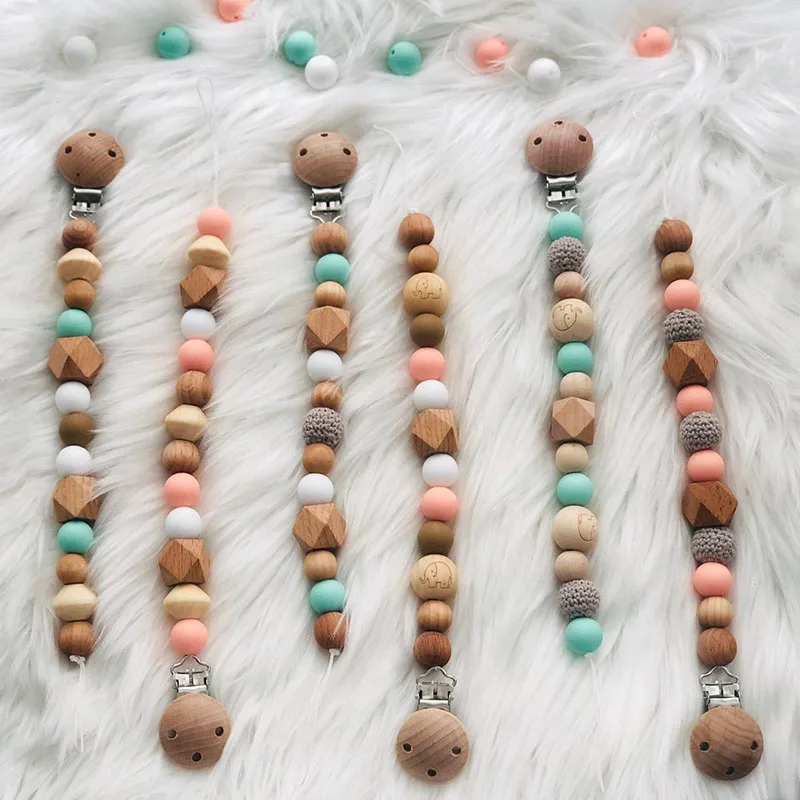 Food Garde Silicone Wooden Beads Baby Dummy Holder Chain Infant Teething Soother Clip
Food Garde Silicone Wooden Beads Baby Dummy Holder Chain Infant Teething Soother Clip